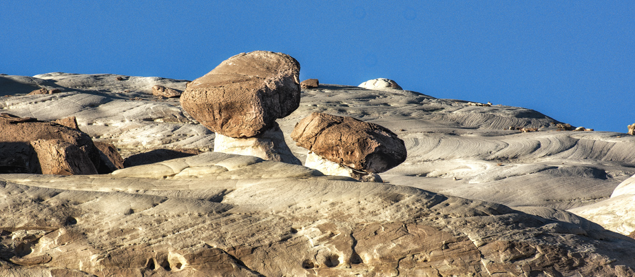 These hoodoos, high on the ridge above, really do look like toadstools.